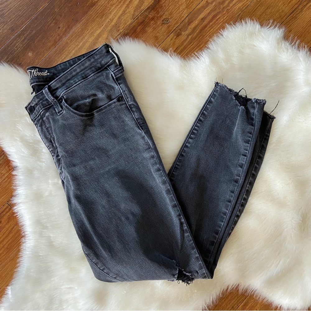 Distressed Black Mid Rise Skinny Jeans